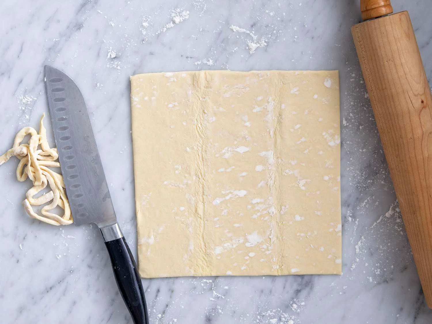 Preheat the oven to 400 degrees F (200 degrees C). Unfold pastry sheets; repair any cracks by pressing them back together. Trim each sheet i