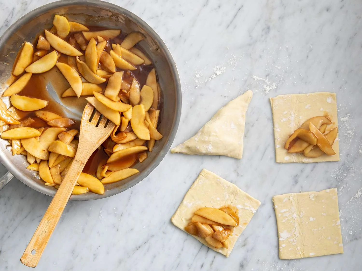 Cut each into 4 smaller squares. Spoon apples onto the center of each square. Fold over from corner to corner into a triangle shape; press e