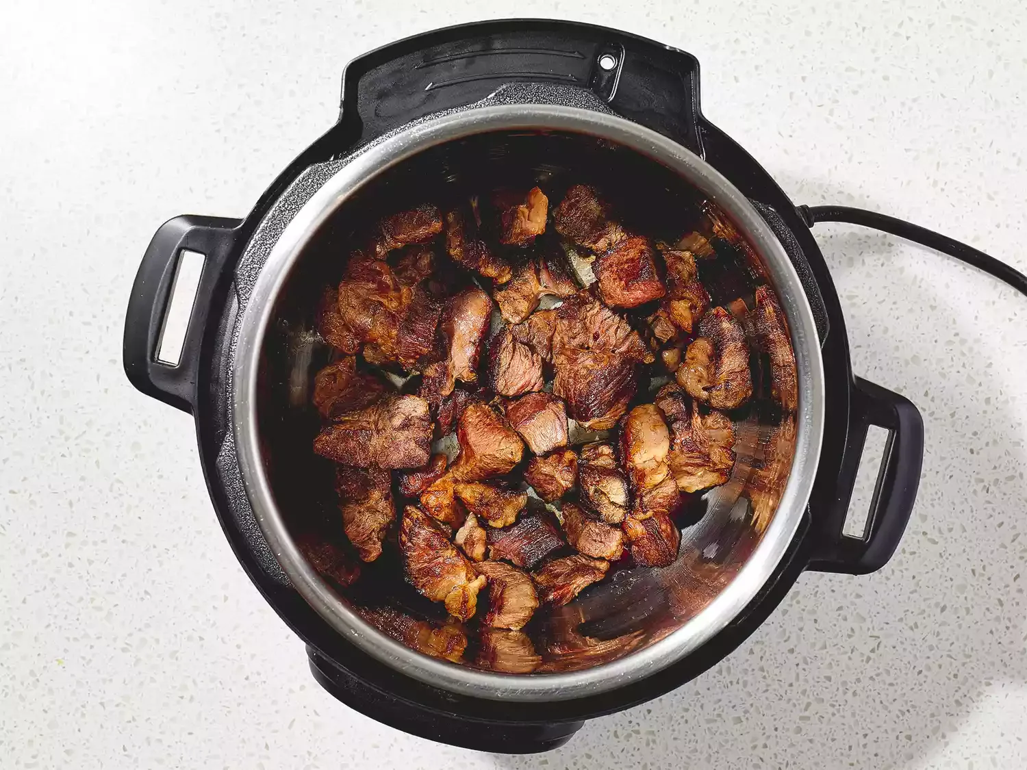 Meat chunks in pressure cooker